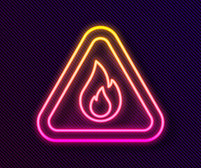 Glowing neon line Fire flame in triangle icon isolated on black background. Warning sign of flammable product. Vector