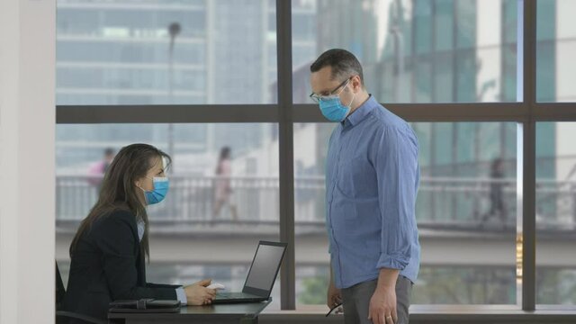 Person being accepted by scanning valid digital health vaccination passport certificate at the entrance, controlled access during COVID-10 Coronavirus pandemic restrictions