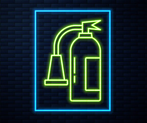 Glowing neon line Fire extinguisher icon isolated on brick wall background. Vector