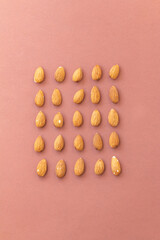 group of nuts on brown background, healthy food concept, empty space for text

