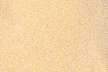 Fototapeta premium Sand texture background. Brown desert pattern from tropical beach.