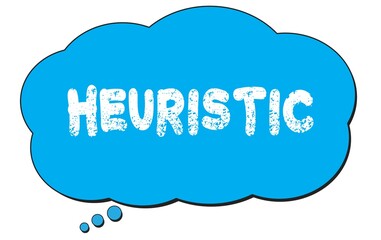 HEURISTIC text written on a blue thought bubble.