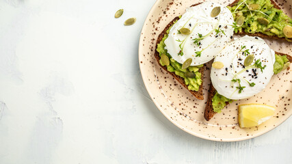Sandwich with avocado and egg. Breakfast with vegetarian food, healthy diet concept. banner, menu recipe place for text, top view
