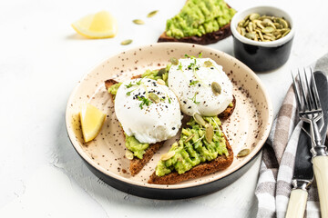 Sandwich with avocado and egg. Breakfast with vegetarian food, healthy diet concept. banner, menu recipe place for text, top view