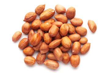 Macro Close-up of organic red-brown peanuts (Arachis hypogaea) cleaned on a white background. Top view