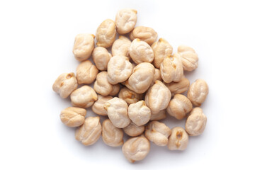 Macro Close-up of Organic chhole chana or Kabuli chana (Cicer arietinum) or whole white Bengal gram dal cleaned on a white background. Top view