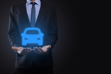 Digital composite of Man holding car icon.Car automobile insurance and car services concept. Businessman with offering gesture and icon of car.