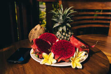 Fresh fruits on wooden table in summer day