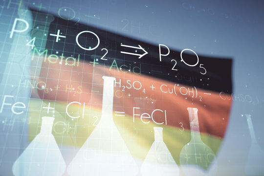 Abstract virtual creative chemistry hologram on flag of Germany and sunset sky background. Multiexposure