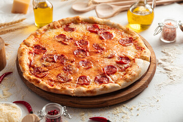 Fresh baked pepperoni pizza on the white background