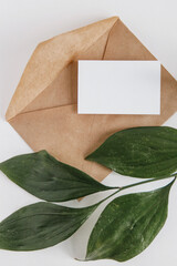 white blank note paper on brown paper envelope