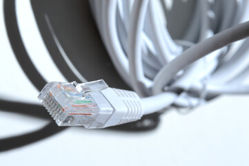 Twisted Lan wire with connector rj 45. close-up.