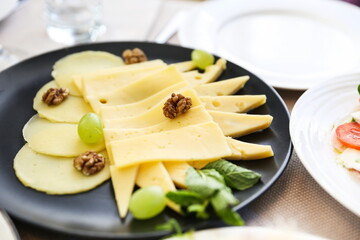 cheese plate on a served table close up