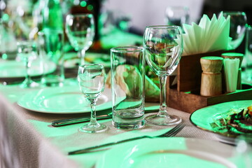 glasses on a served table in a restaurant 