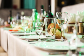 glasses on a served table in a restaurant 