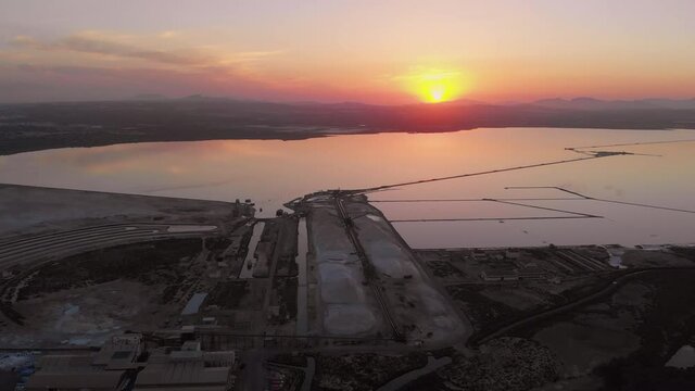 Drone point of view sunset of Santa Pola salt lake. Europe, Costa Blanca, Spain