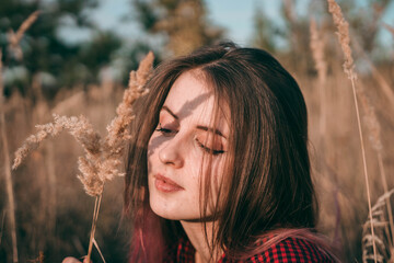 girl in the field enjoying the view
