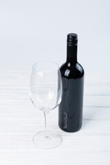 Wine glasses, bottle of red wine