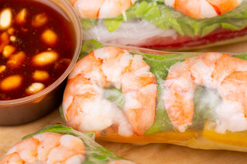 Shrimp rolls, lettuce leaves, vegetables and sauce