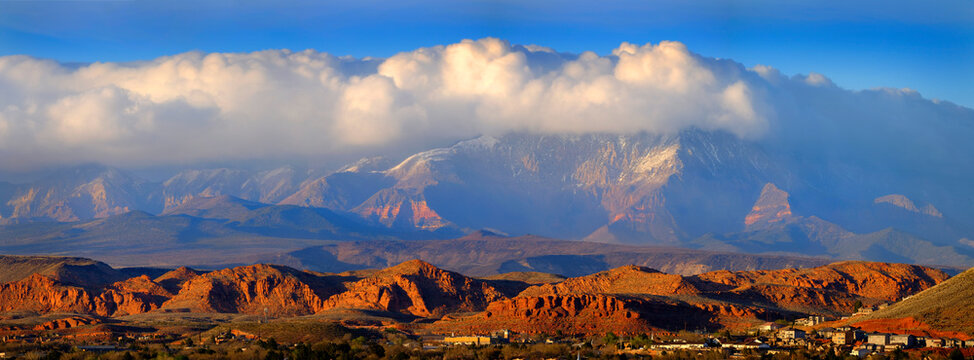 View of St. George Utah valley with Mormon LDS Temple red rocks and snowy mountains