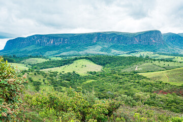 Fototapeta na wymiar Brazilian eco tourism landscape of Minas Gerais state at Serra da Canastra region, at São Roque de Minas city. Far view of the sierra on a cloudy day.