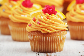 Cupcakes with orange icing on top