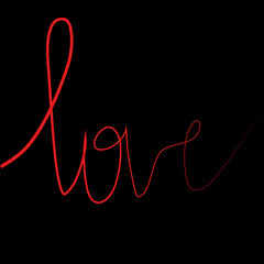 Text love red color hand writing on black