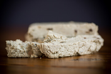 piece of sweet halva on a wooden table