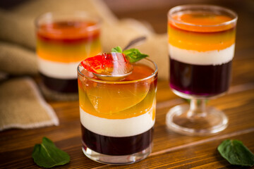 lot of colored sweet fruit jelly in a glass