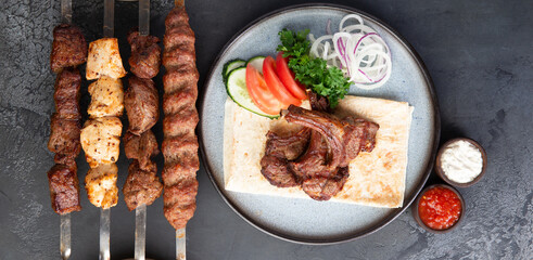 Platter of kebabs. Kebab chicken, kebab with lamb, a shish kebab of chicken