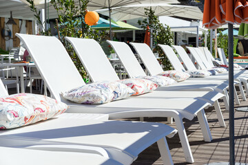 terrace with daybed and umbrellas
