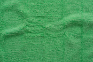 green fabric microfiber cleaning cloth background