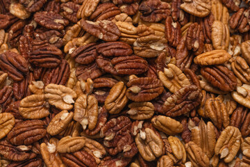 Tasty pecan-nut background. Top view.