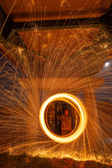 Fototapeta premium long exposure of burning metal voll