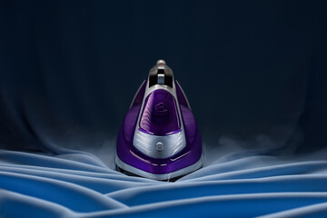 purple iron floats on blue fabric