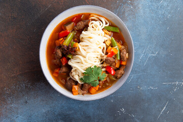 Laghman is a traditional beef noodle soup.