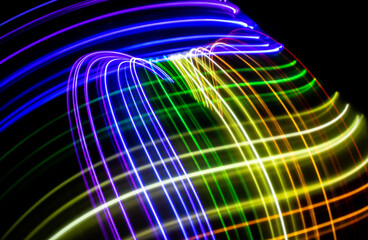 Linear strokes of lights with the colors of the rainbow. 3D illustration or 3D rendering. Gay community holiday concept.