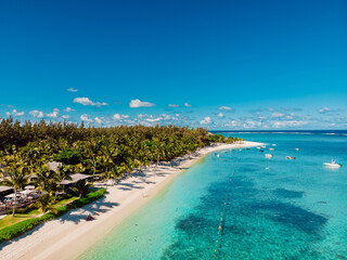 Luxury beach with resort and ocean in Mauritius. Aerial view