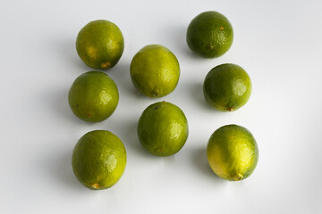 Lemon on white background - green and yellow.