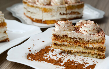 Piece of butter cream cake with a chocolate chips