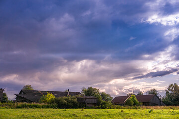 Fantastic evening weather before the rain. Evening sunset in the countryside. The concept of the...