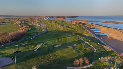 Drone point of view of a golf course by the coast in Felixstowe, Suffolk, UK © Rob