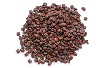 Many coffee beans are heaped. Isolated over white background
