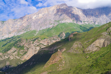 Naklejka premium Watchtower in the Cherek-Bezengi River gorge in the Bezengi Valley