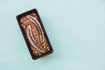 Freshly baked homemade gluten free banana bread cake with walnuts. Sweet food. Popular  american dessert.