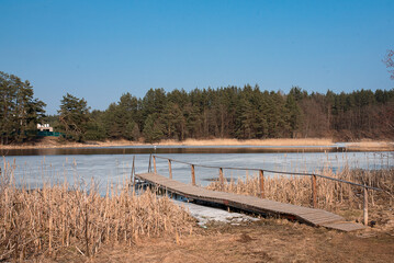 Naklejka premium lakeside bridge land, water, air