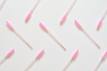 close up of a red and white brushes 