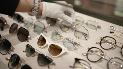Ophthalmologist Hands Close Up Choosing Glasses