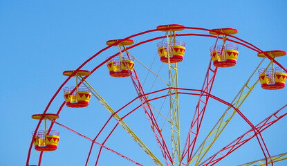 Ferris wheel in the summer morning