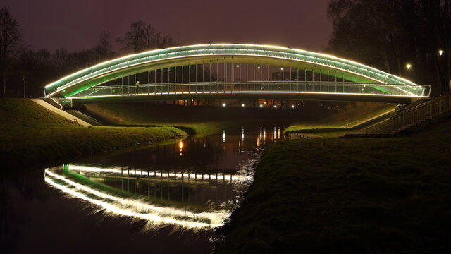 Poland, Lublin, The bridge at the Ludowy Park at night.